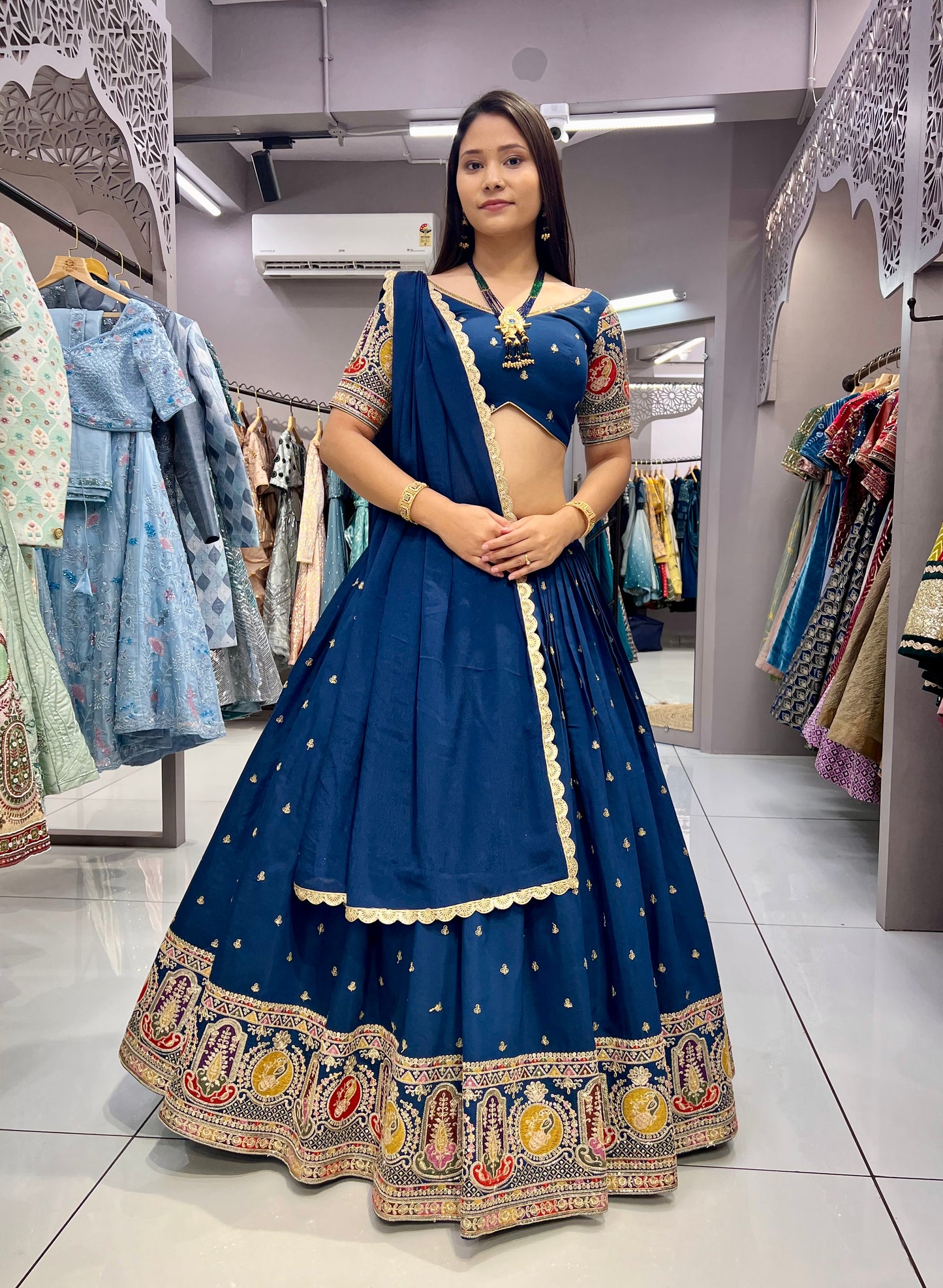 Chic Rama Damaniya Lehenga Choli with Zari and Sequence Work