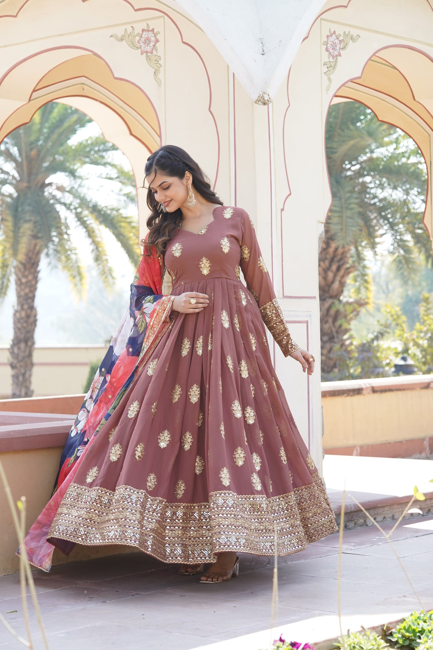 Radiant Rosewood Regal Gown Collection