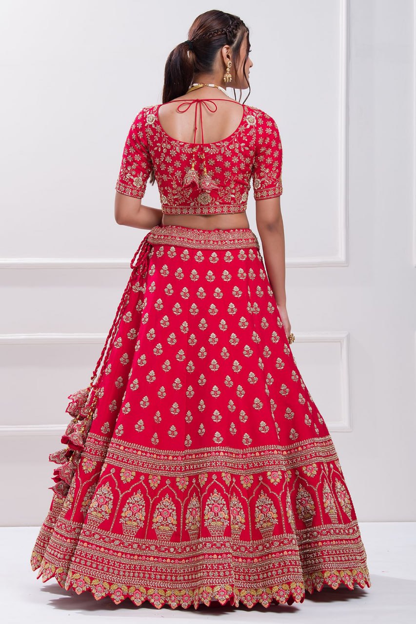 Red aada slub embroidered bridal lehenga choli.