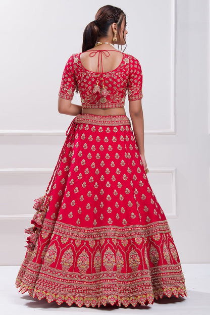 Red aada slub embroidered bridal lehenga choli.