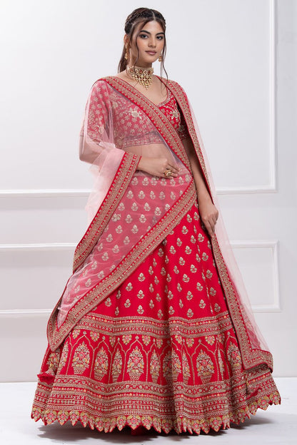 Red aada slub embroidered bridal lehenga choli.