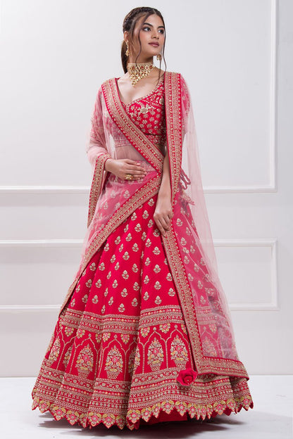 Red aada slub embroidered bridal lehenga choli.