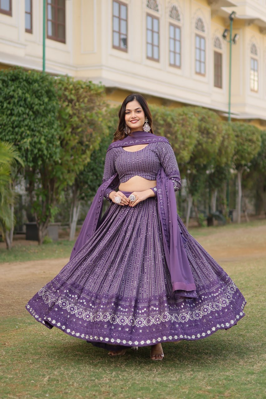 Elevate your style with Onion Coloured Faux Georgette Lehenga Choli With Dupatta Set.