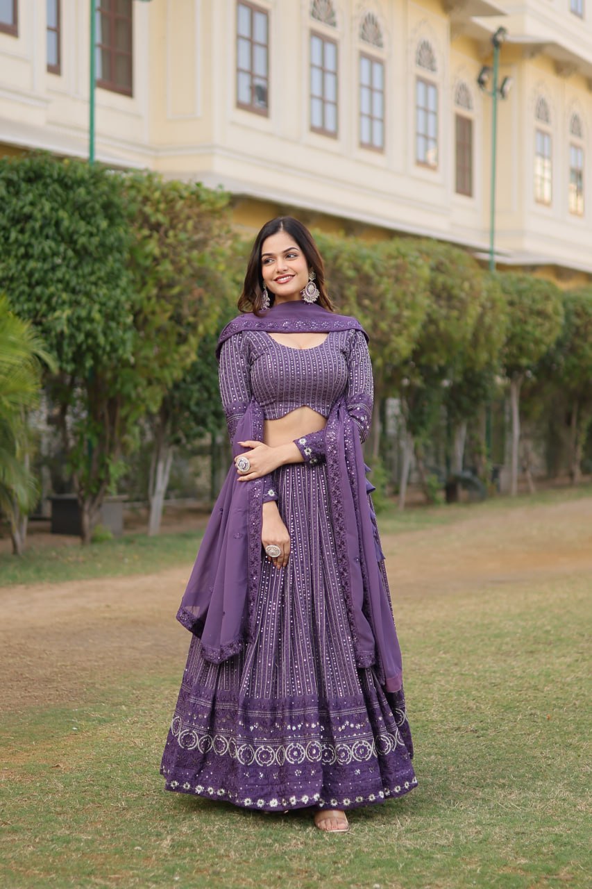 Elevate your style with Onion Coloured Faux Georgette Lehenga Choli With Dupatta Set.